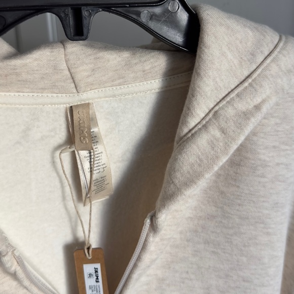 Skims Cotton Fleece Classic Zip Up Hoodie in Oatmeal Heather Size Large - Picture 6 of 10